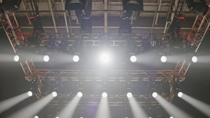 Stage lighting rig with spotlights