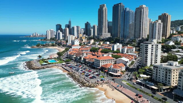 Coastal cityscape with beach and highrise buildings