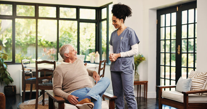 Conversation, caregiver and senior man in nursing home, retirement assistance and kindness for wellness. Smile, discussion and nurse with old person for support, elderly care and empathy for health