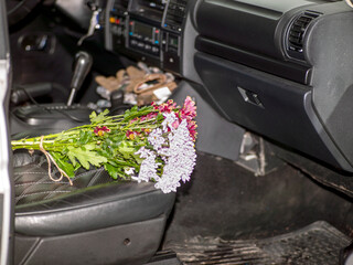 bouquet on a car seat