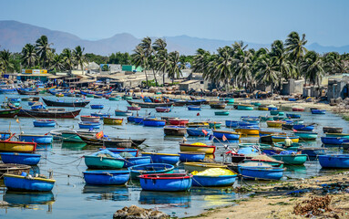 Colorful basket boats in a fishing village in Phan Rang, Vietnam.