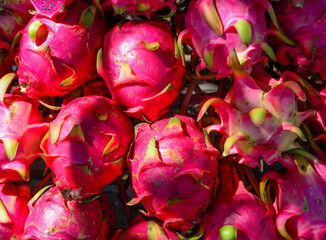 Selling dragon fruit in a local shop