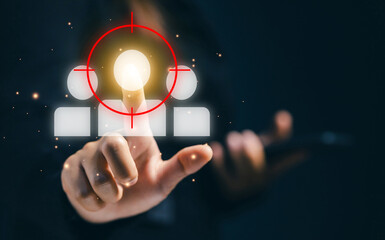 Business professional selecting a highlighted user icon with targeting symbol, representing talent acquisition, human resource selection, recruitment strategy, and digital HR management.
