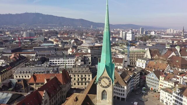 Zurich, Switzerland: Aerial drone footage of in Zurich old town with  the Fraumunster church and the Paradeplatz with its banking HQ buildings in Switzerland largest city. 