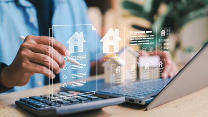 Businessman using digital tablet with virtual property documents and checklist icons. Concept of real estate technology, online mortgage, smart contract, and house investment.