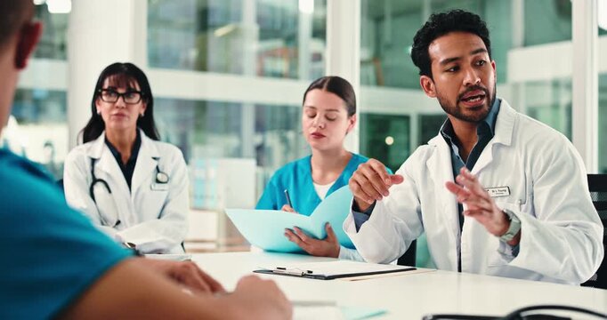 Meeting, documents and doctors with nurses in hospital boardroom for surgery schedule in collaboration. Discussion, professional and team of healthcare employees with medical paperwork in clinic.