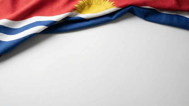 Kurdistan flag partially draped over a white background, ideal for patriotic themes or cultural projects.