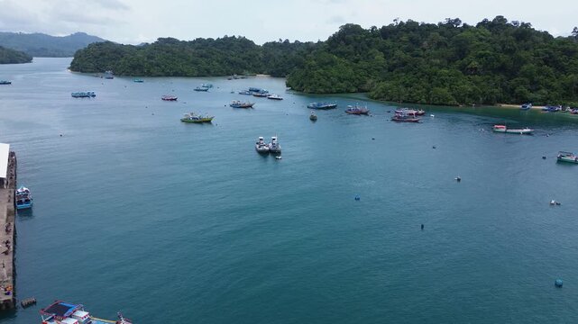 4K Aerial View of Traditional Fishing Village and Colorful Boats at Sendang Biru, Malang