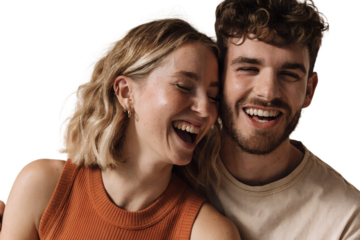 Happy young couple smiling together in a romantic portrait