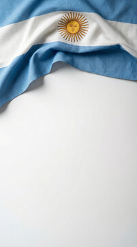 Detailed close-up of the Argentina flag showcasing blue and white stripes and the Sun of May emblem, perfect for educational materials or cultural presentations.