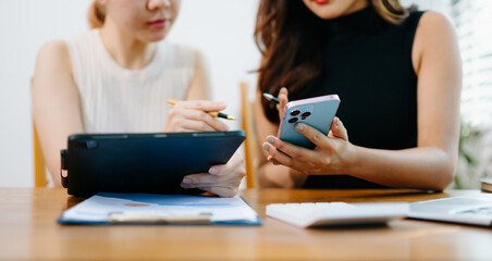 Team business meeting presentation. Hand businessman working project in modern office.Laptop computer and tablet and smart phone