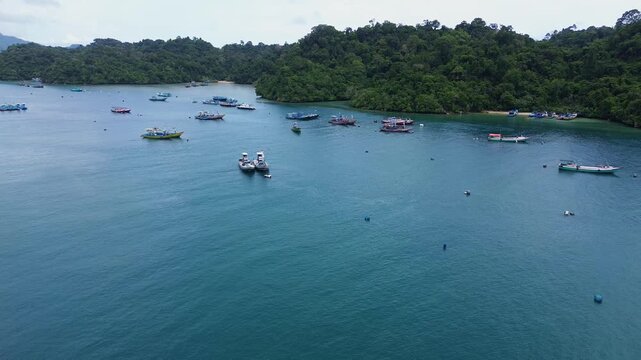 4K Aerial View of Traditional Fishing Village and Colorful Boats at Sendang Biru, Malang