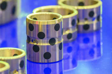 Close Up of Oil Free Alloy Straight Bushings for Industrial Machinery