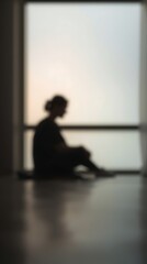 Generative AI Silent Individual Sitting by a Large Window with Soft Light