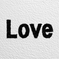 Hand drawn Love text with grainy charcoal texture on paper