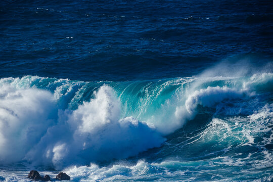 Huge crashing waves in the ocean. Summer and surf concept. Ocean textures. 