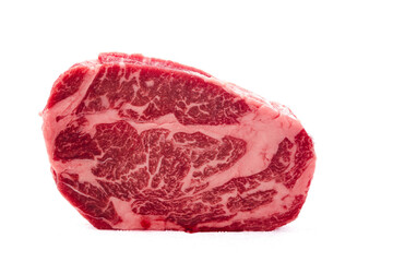 Obraz premium Premium Raw Ribeye Steak with Marbling Isolated on White Background for Culinary Photography