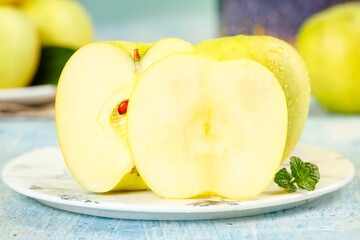 Fresh Yellow Apples Halved - Crisp, Juicy, and Healthy Fruit © HoangVan