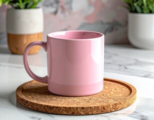 Pink mug on cork coaster, plants behind