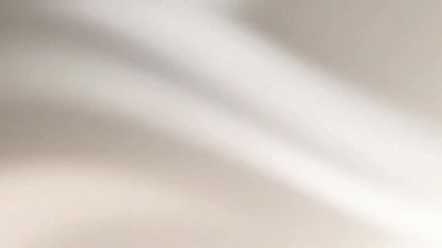 Soft Abstract Fabric Texture with Flowing Light and Gentle Neutral Tones
