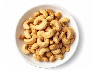 Cashews in a white ceramic bowl, top view