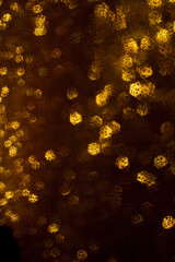 Christmas background. Festive abstract background with bokeh defocused lights and stars