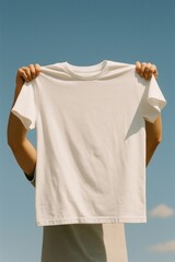 Blank white t-shirt skyward.