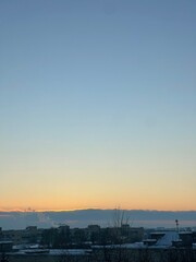 Naklejka premium sunset over the city