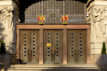 Facade of the New City Hall (Nov&aacute; Radnice) in Prague with Art Nouveau sculptures and entrance
