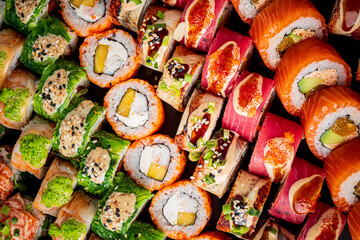 Exquisite sushi rolls arranged beautifully, showcasing textures, colors, and delicious fillings