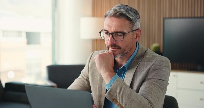 Investor, laptop and man in workplace, thinking and email for trading portfolio, internet and website info. Mature person, broker and employee with pc, checklist for company audit and online reading