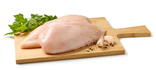 fresh chicken breast meat on cutting board