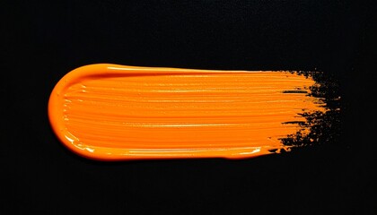 Textured Orange Paint Smear with Dynamic Brushstroke on Black Background