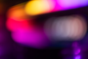 Colorful glow Light flare sparks texture. red orange rays on dark blue abstract overlay