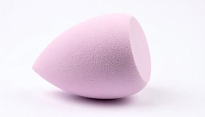 Obraz premium Close-Up of a Pink Makeup Sponge on a White Background