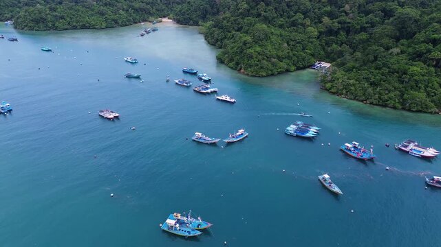 4K Aerial View of Traditional Fishing Village and Colorful Boats at Sendang Biru, Malang