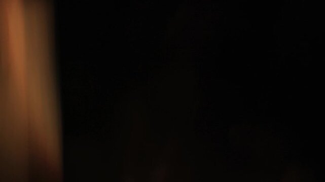 4K ethereal light leak animation, subtle lens flare glow. Vintage golden orange bokeh, retro cinematic mood. Elegant wedding transition, party, vlog intro, outro - Powered by Adobe