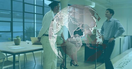 Discussing three office workers wearing office attire in modern office, holographic globe overlay