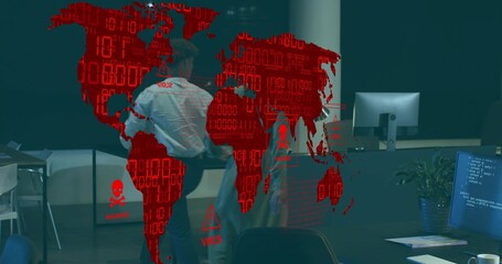 Discussing two staff wearing business shirts holding jacket near desks in office with red cyber map
