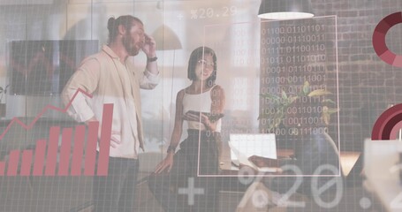 Discussing three team members analyzing charts in casual attire at office desk, with laptop reports