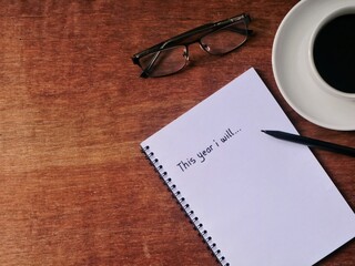 2026 new year resolution concept. This year i will handwriting on notebook. representing motivation, productivity, and future resolution