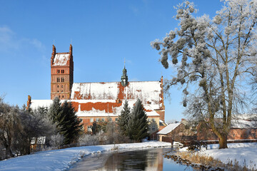 Collegiate Basilica in winter in Dobre Miasto, Warmia, Poland	