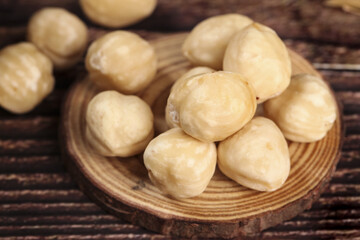 Fototapeta premium Roasted Hazelnut Kernels on Wood - Healthy Natural Snack