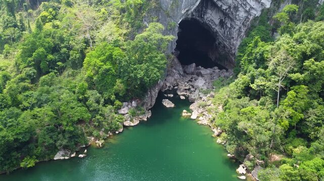 River flowing toward Xe Bang Fai Cave in jungle landscape
