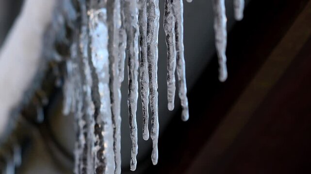 icicles on a house in winter 4k 25fps video