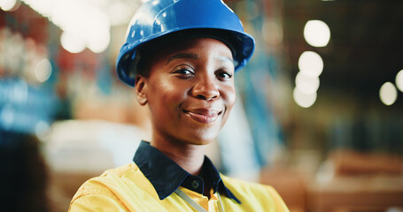 Happy, logistics and portrait of black woman in warehouse with confidence for industrial career. Smile, bokeh and African female supply chain worker with pride for freight, cargo or delivery.