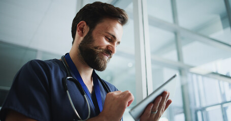 Smile, man and nurse with tablet in hospital for research, medical report and telehealth. Male person, reading and digital with healthcare information, treatment planning and happy for surgery agenda