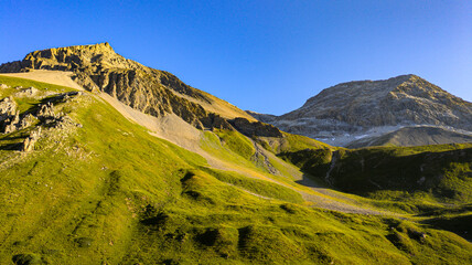Mountain and lake landscape at the Albula Pass in Switzerland, showcasing pristine alpine nature.