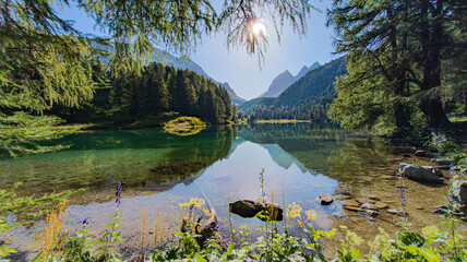 Mountain and lake landscape at the Albula Pass in Switzerland, showcasing pristine alpine nature.