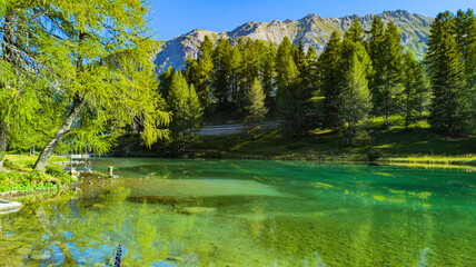 Mountain and lake landscape at the Albula Pass in Switzerland, showcasing pristine alpine nature.